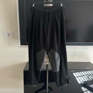 Black nice pants with leather on the knee. It is nice it said size 1